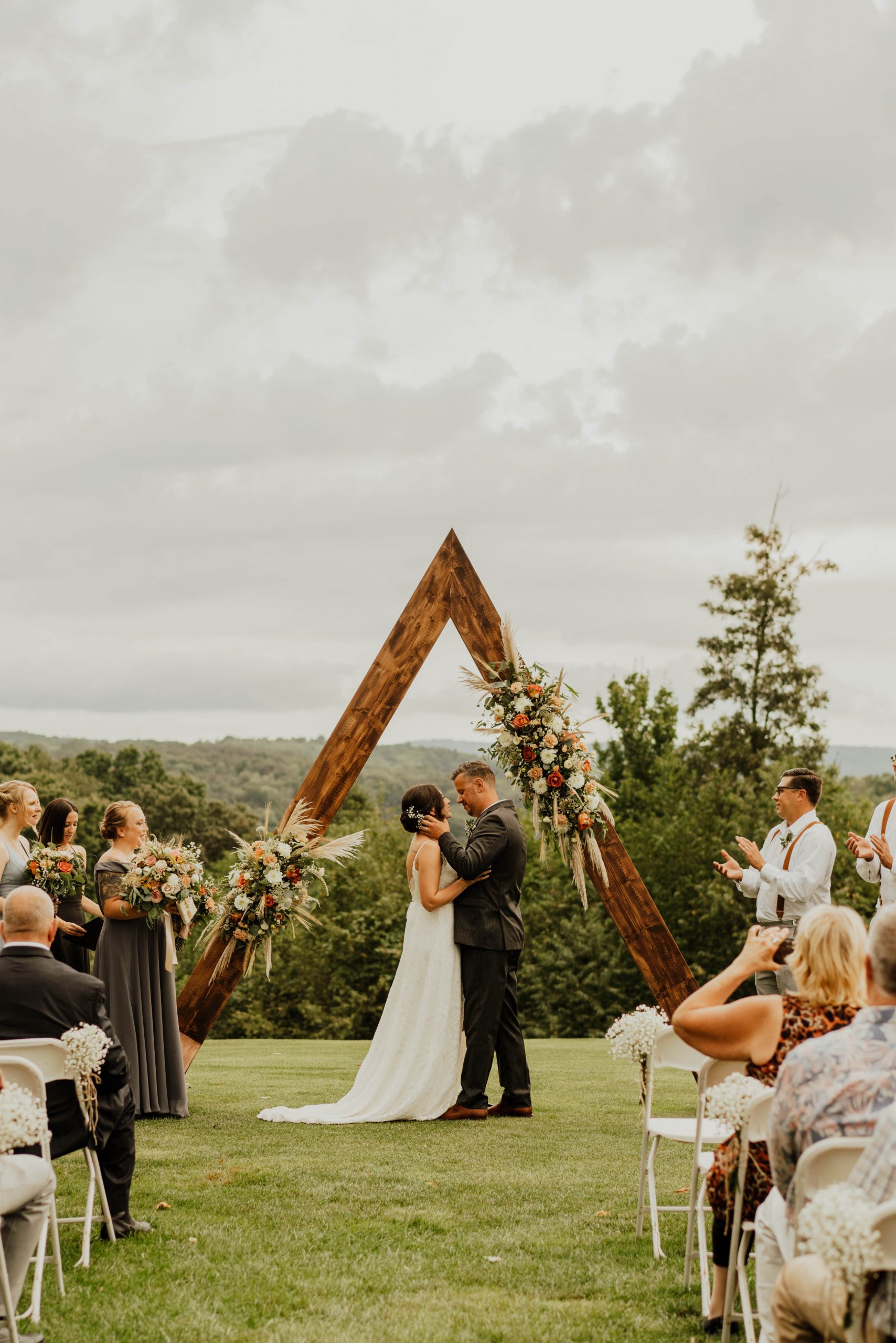 Alex and Phil hosted their boho-style wedding at The Punxsutawney Country club with an outdoor celebration on a warm summer day